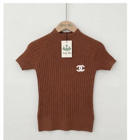 Short-sleeved, mock-neck ribbed knit top sleek, structured design