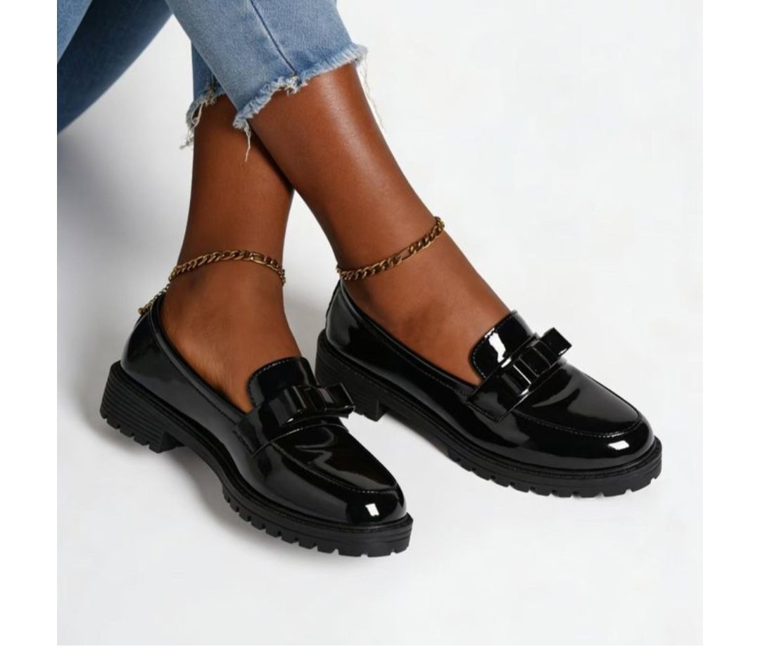 Women's black patent leather lug-sole loafers