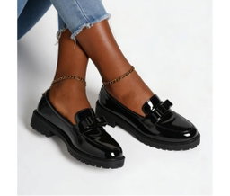 Women's black patent leather lug-sole loafers