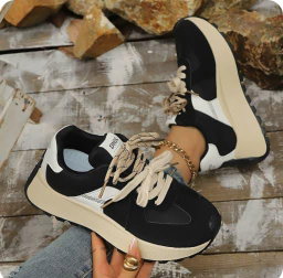 Chunky platform sneakers sporty, retro-running aesthetic.