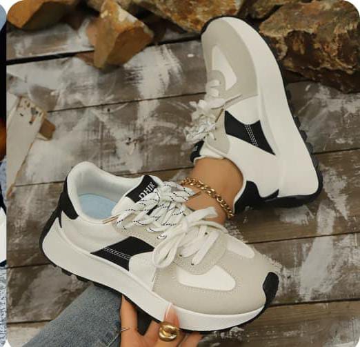 Chunky platform sneakers sporty, retro-running aesthetic._2