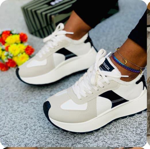 Chunky platform sneakers sporty, retro-running aesthetic._5