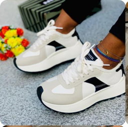 Chunky platform sneakers sporty, retro-running aesthetic.