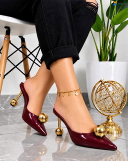 Women's patent leather pointed-toe mule heels dramatic geometric design.