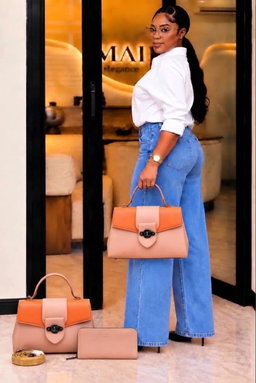 Big structured top-handle handbags,a matching long wallet a detachable shoulder strap.