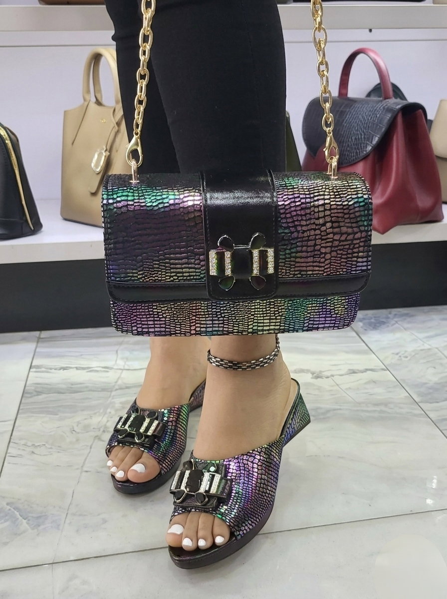 Elegant dress mules and a matching flap handbag,