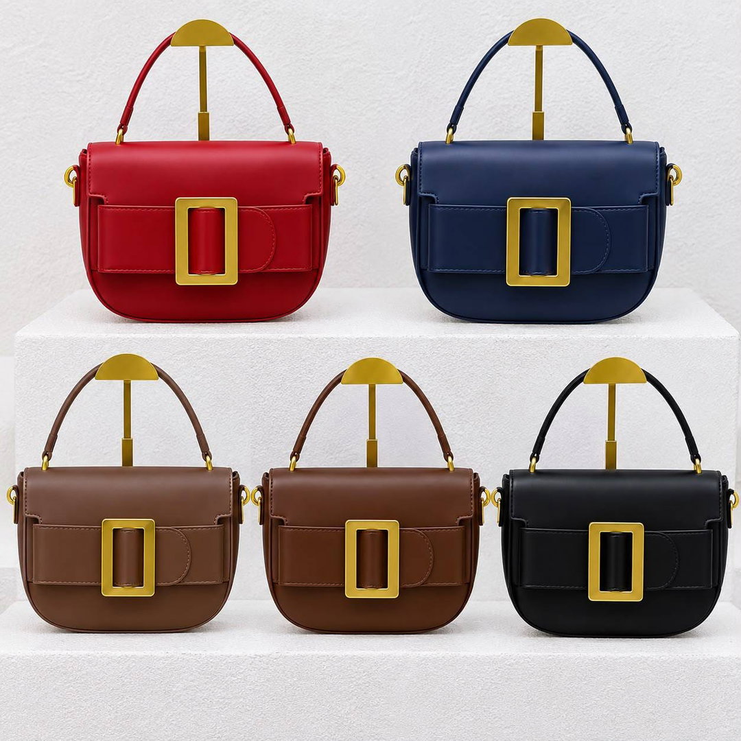 Half-moon silhouette small handbags featuring bold aesthetic.