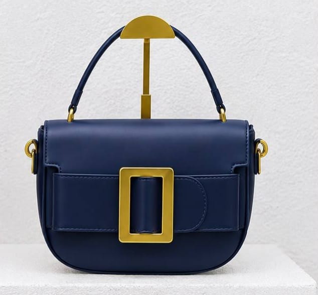 Half-moon silhouette small handbags featuring bold aesthetic._4