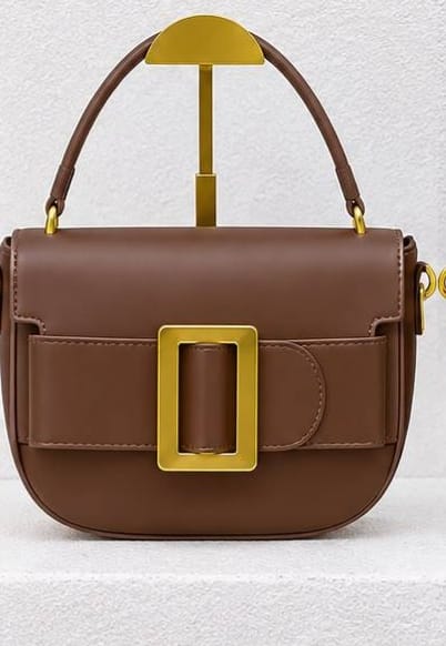 Half-moon silhouette small handbags featuring bold aesthetic._5