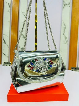 Clutch handbags  structured silhouette trapezoidal base