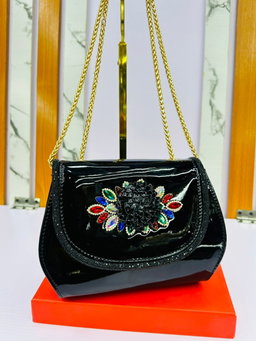 Clutch handbags  structured silhouette trapezoidal base