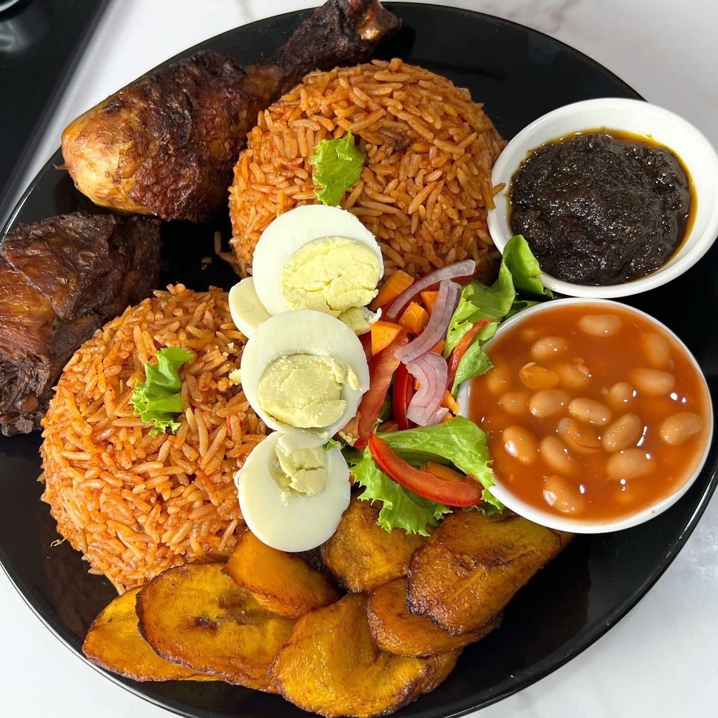 Rice Specialties{ Jollof, Fried rice, plain rice, Waakye, spaghetti and Indomie}_5