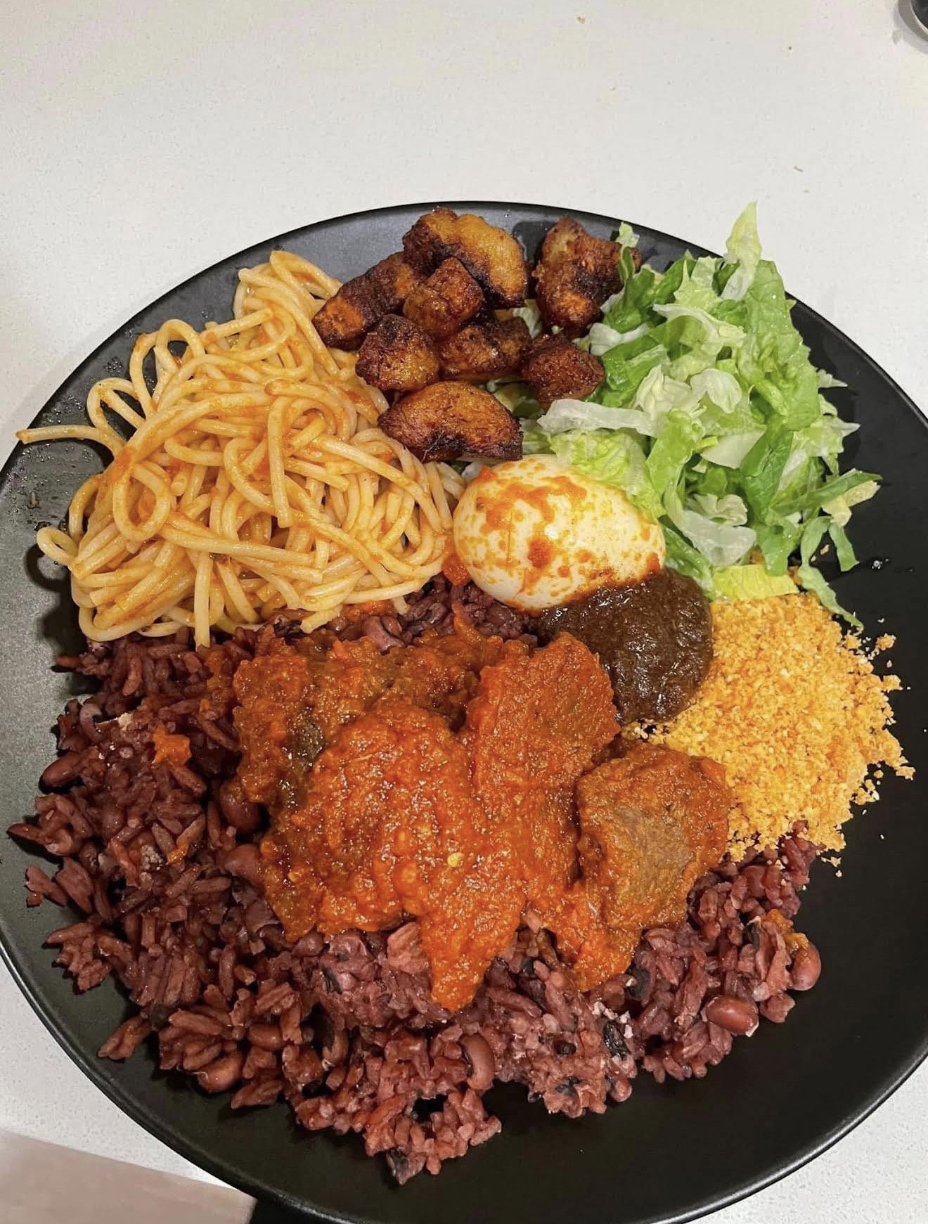 Rice Specialties{ Jollof, Fried rice, plain rice, Waakye, spaghetti and Indomie}_12
