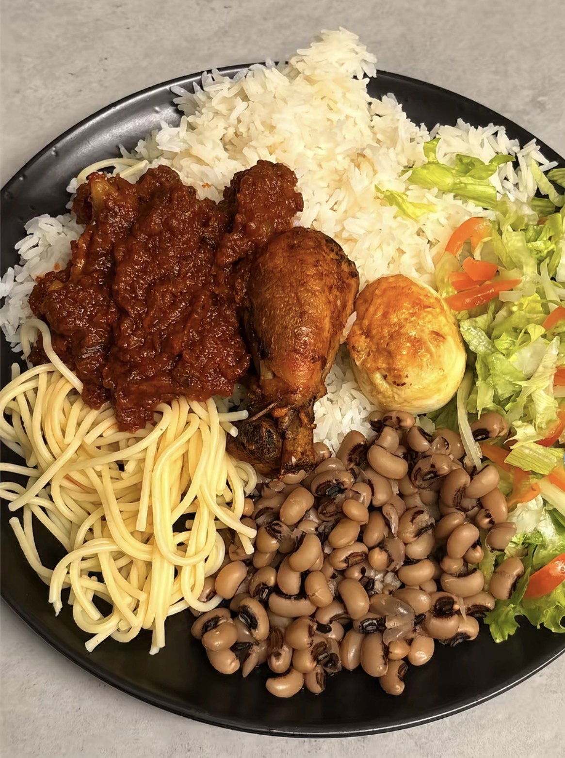 Rice Specialties{ Jollof, Fried rice, plain rice, Waakye, spaghetti and Indomie}_14
