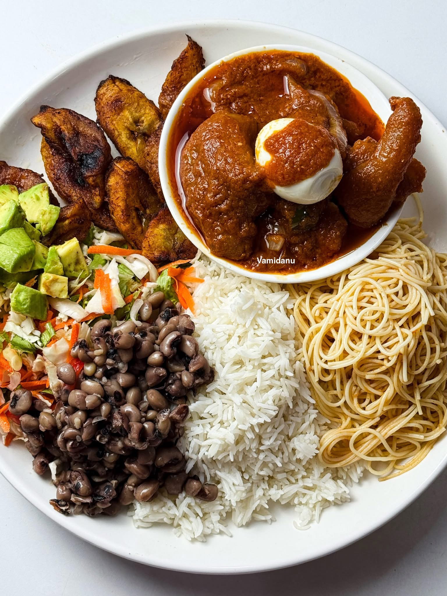 Rice Specialties{ Jollof, Fried rice, plain rice, Waakye, spaghetti and Indomie}_13