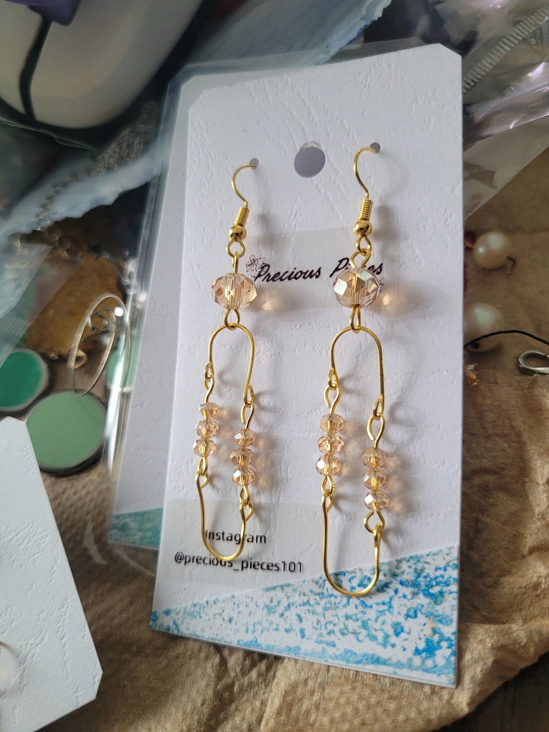 Stainless steel gold earrings with glass beads 