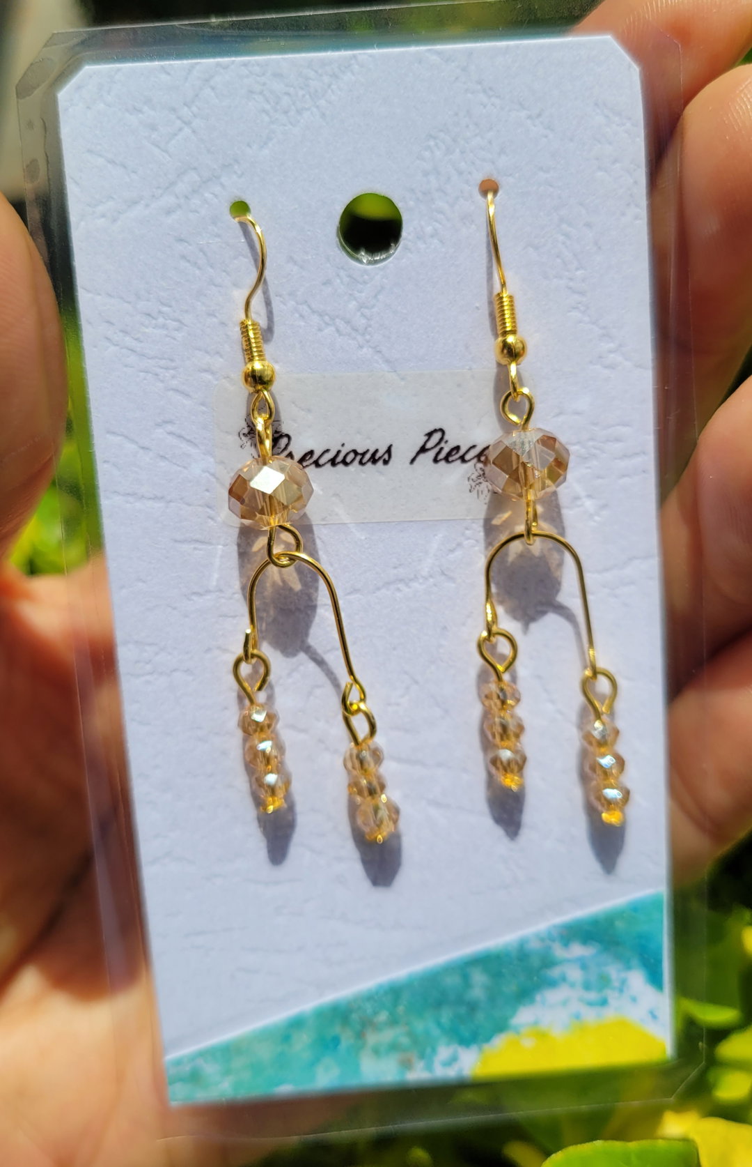 Stainless steel gold earrings with two drop glass beads 