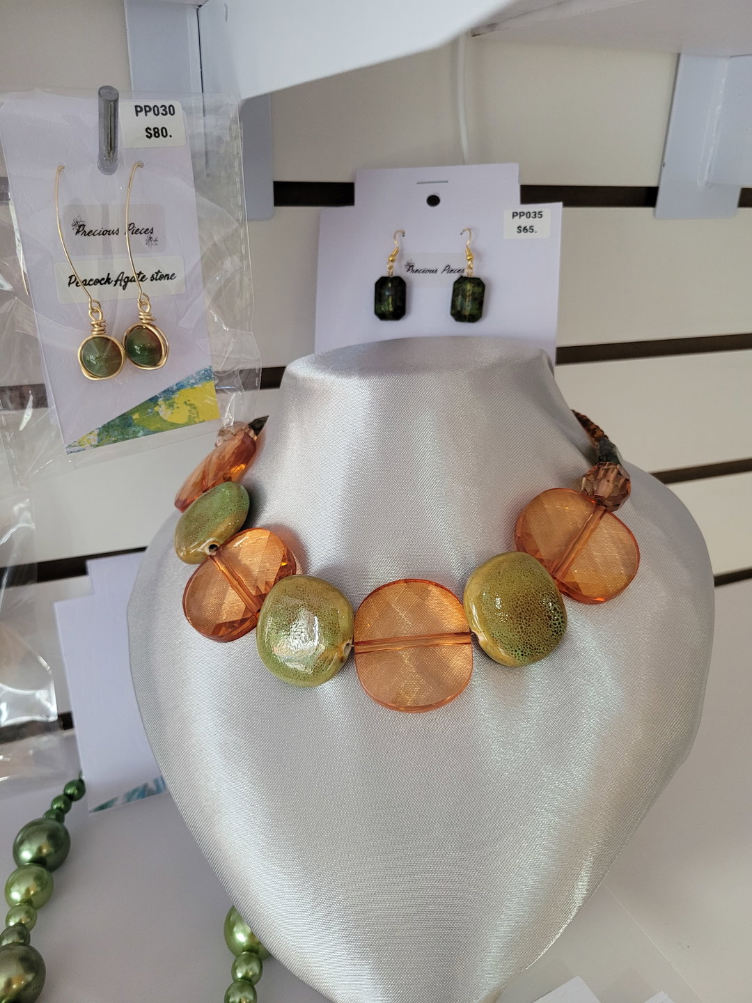 Green and orange acryllic and ceramic necklace set