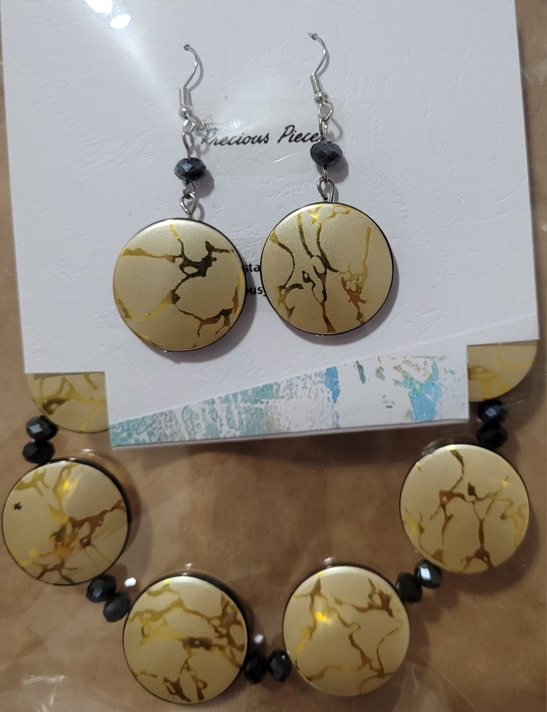 Flat gold bracelet and earring set