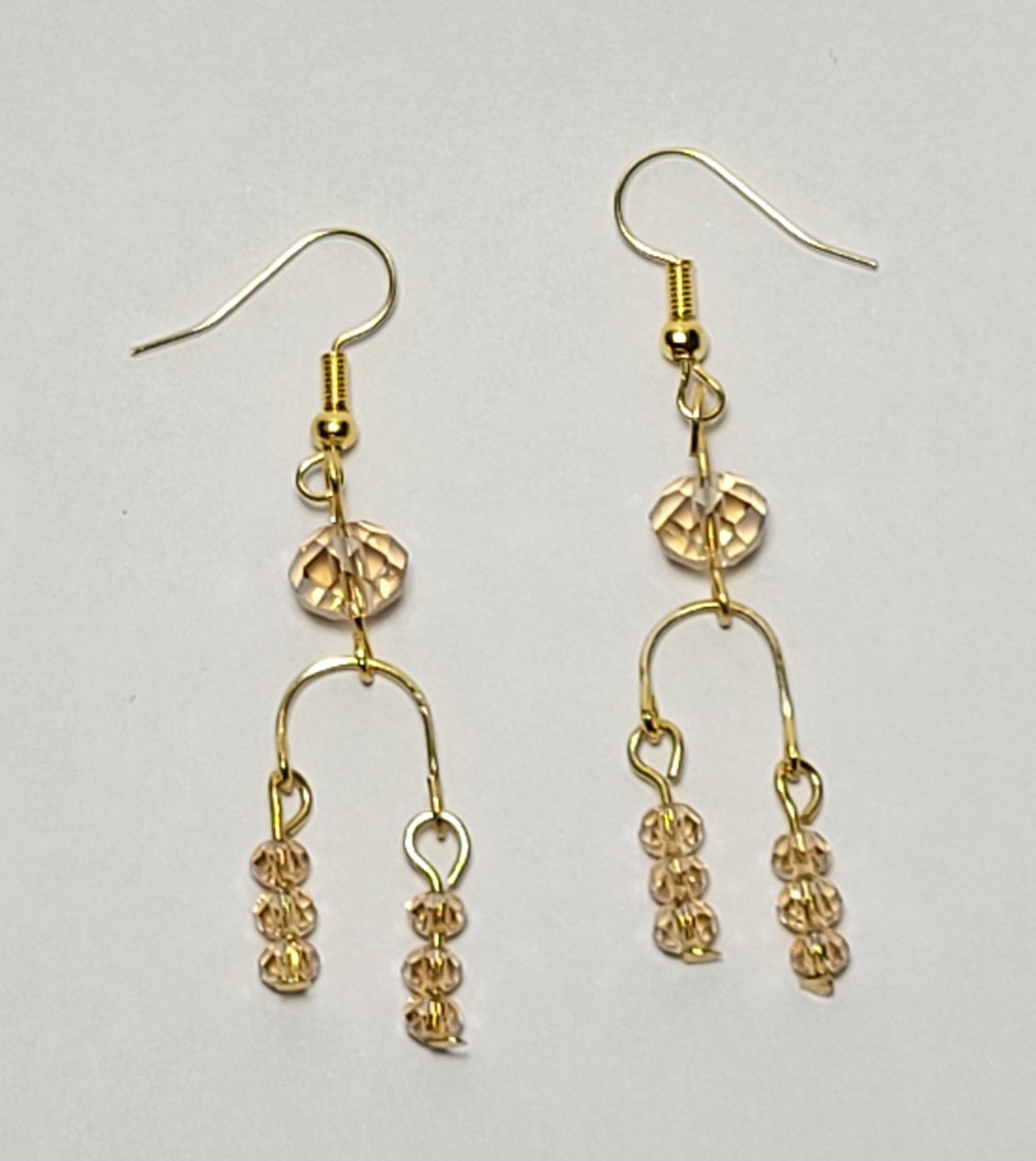 Stainless steel gold earrings with two drop glass beads 