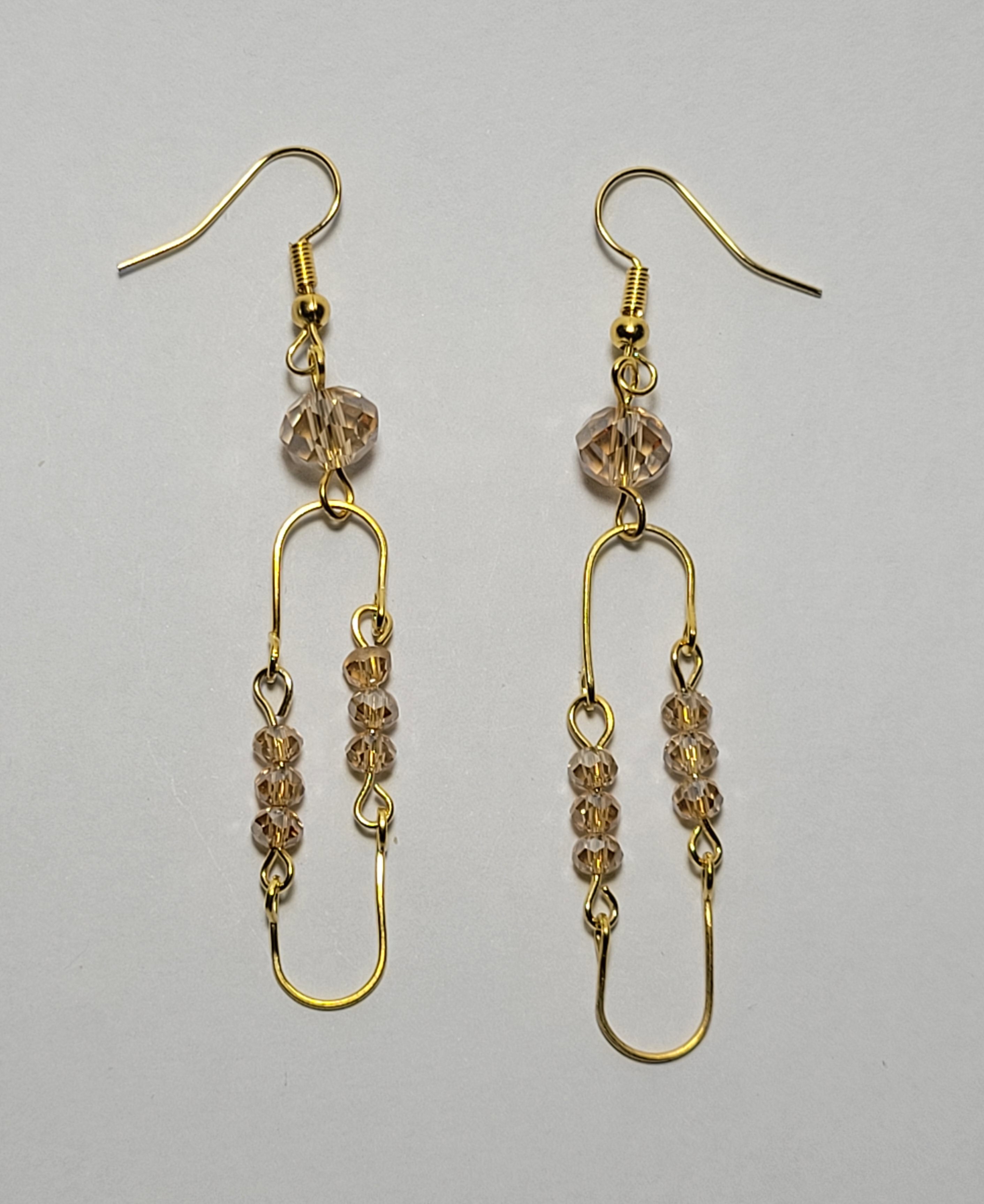 Stainless steel gold earrings with glass beads