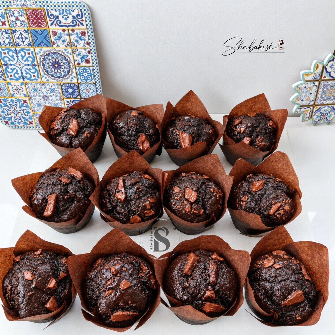 Box of twelve double Nutella and chunky chocolate muffins.