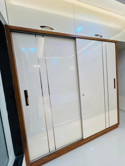 HIGH GLOSS SLIDING BUILT-IN WARDROBE WITH TOP LOFT BOXES