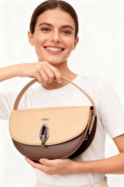 Half-moon / Curved shoulder handbag featuring a dual-tone or monochromatic leather panel design.