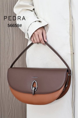 Half-moon / Curved shoulder handbag featuring a dual-tone or monochromatic leather panel design.