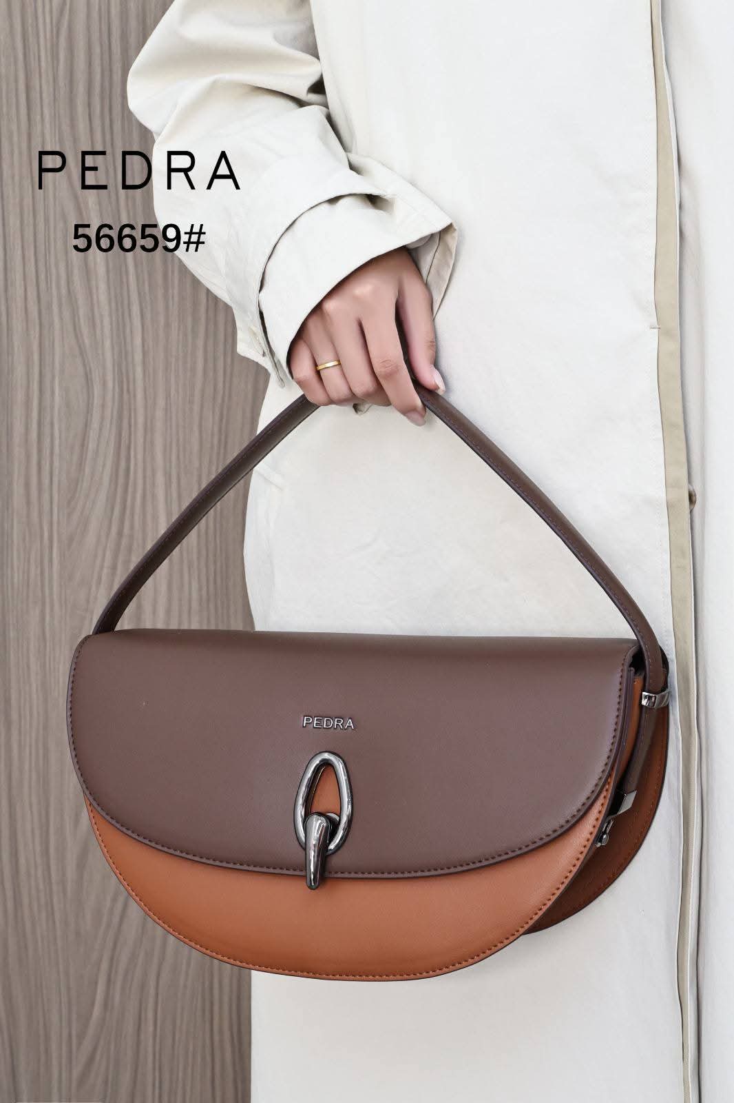 Half-moon / Curved shoulder handbag featuring a dual-tone or monochromatic leather panel design._7
