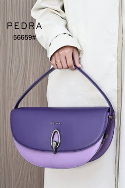 Half-moon / Curved shoulder handbag featuring a dual-tone or monochromatic leather panel design.