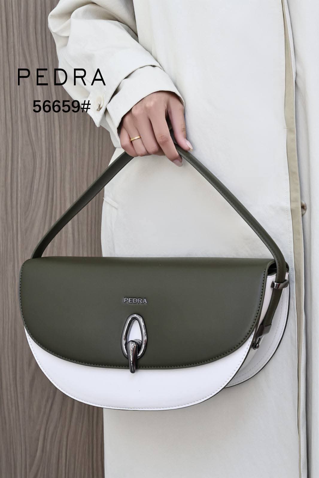 Half-moon / Curved shoulder handbag featuring a dual-tone or monochromatic leather panel design._11