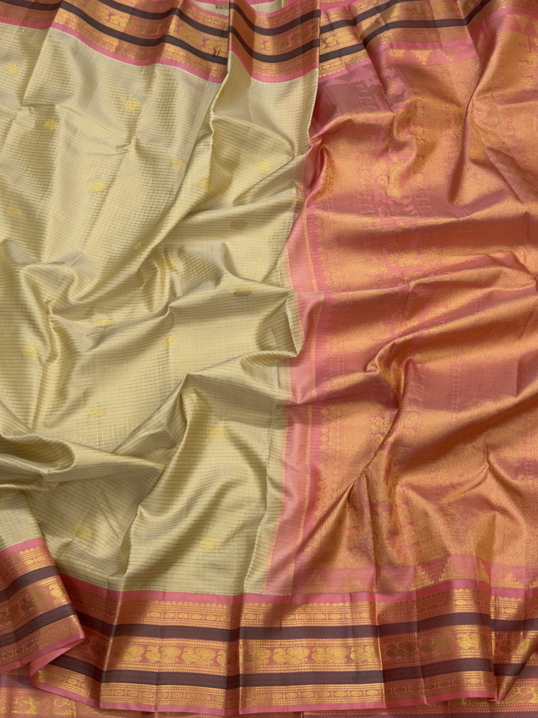 Beige Kanchipuram with peach pink pallu