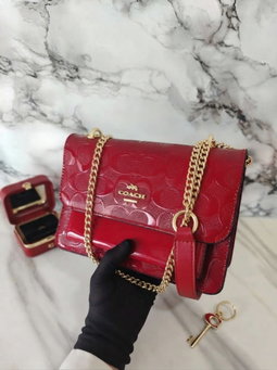 Coach chained red