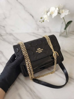 Coach black chained 