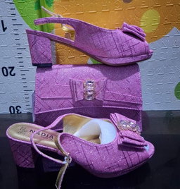 2-piece set featuring mid-heel slingback sandals and a structured clutch purse,