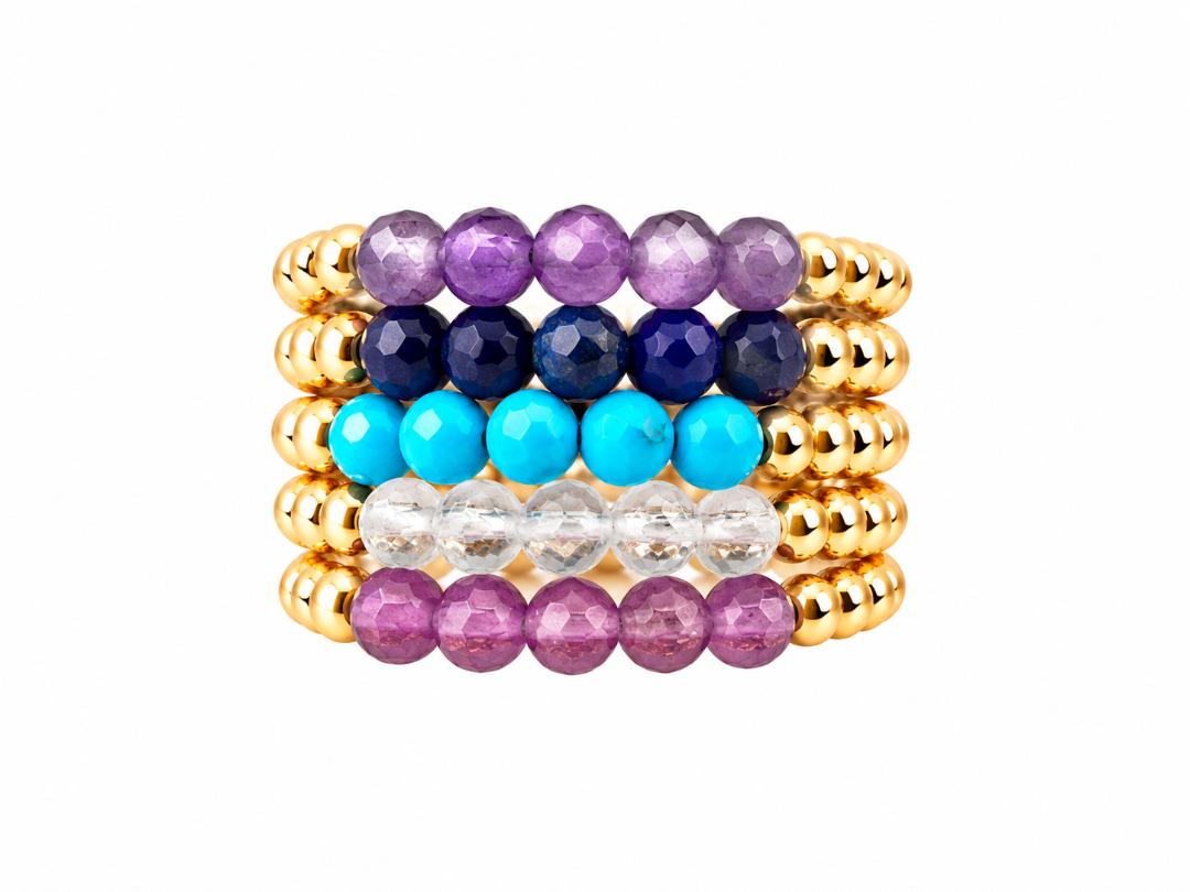 Anillo stretch de cobre con baño de oro de 18k y piedras semipreciosas