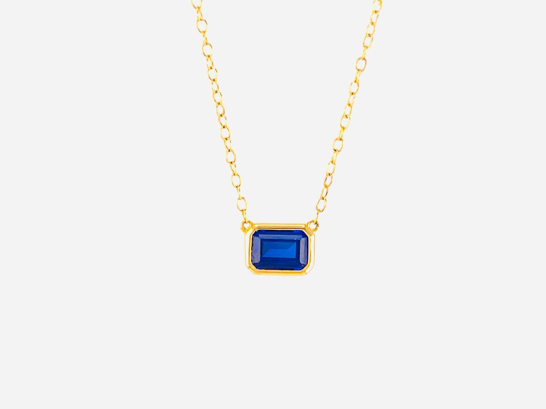 Collar de plata con baño de oro de 18k con Safiro_0