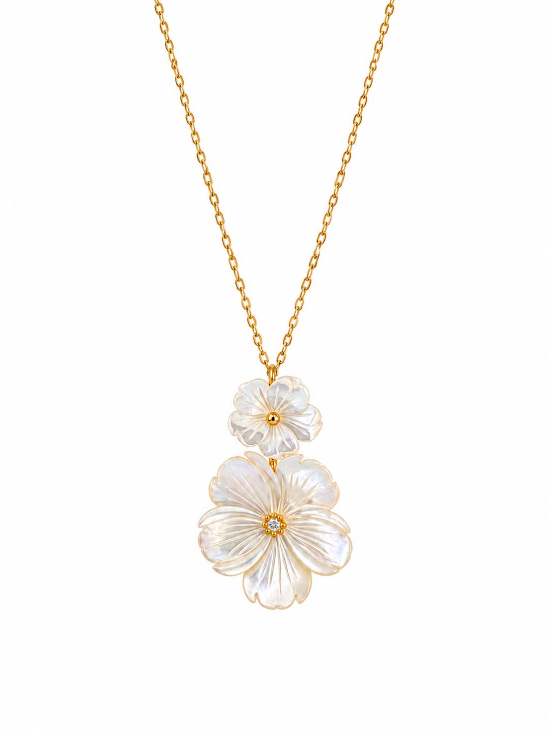 Collar de plata con baño de oro de 18k y Concha Nácar y Topacio