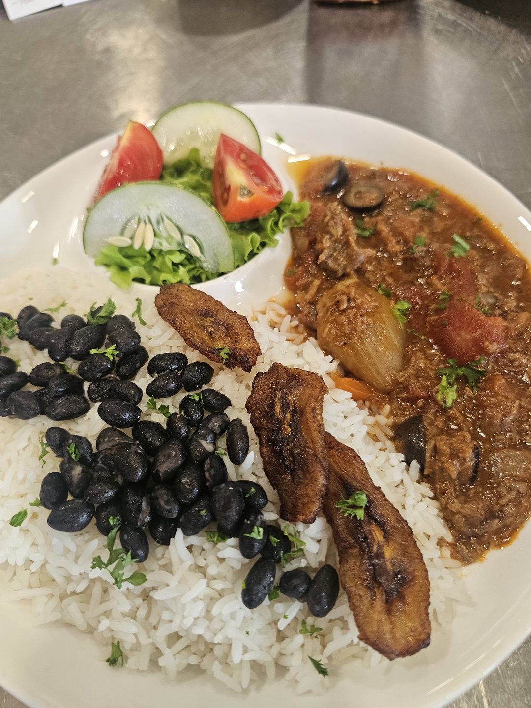 Beef Ropa Vieja, plantain, black beans w/rice