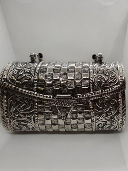 Carved oxidized bag with handle