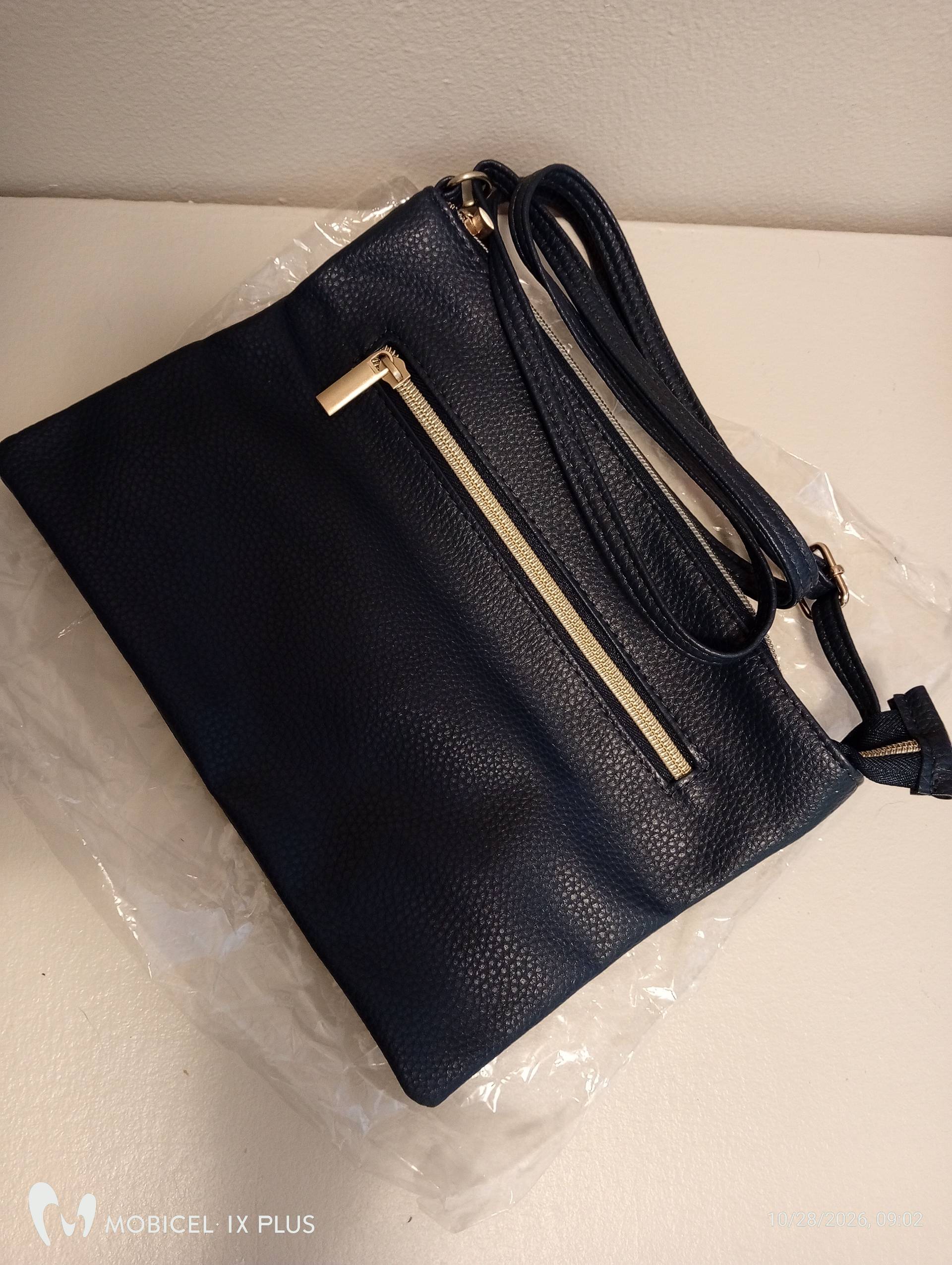 Navy sling bag Avon 50%off
